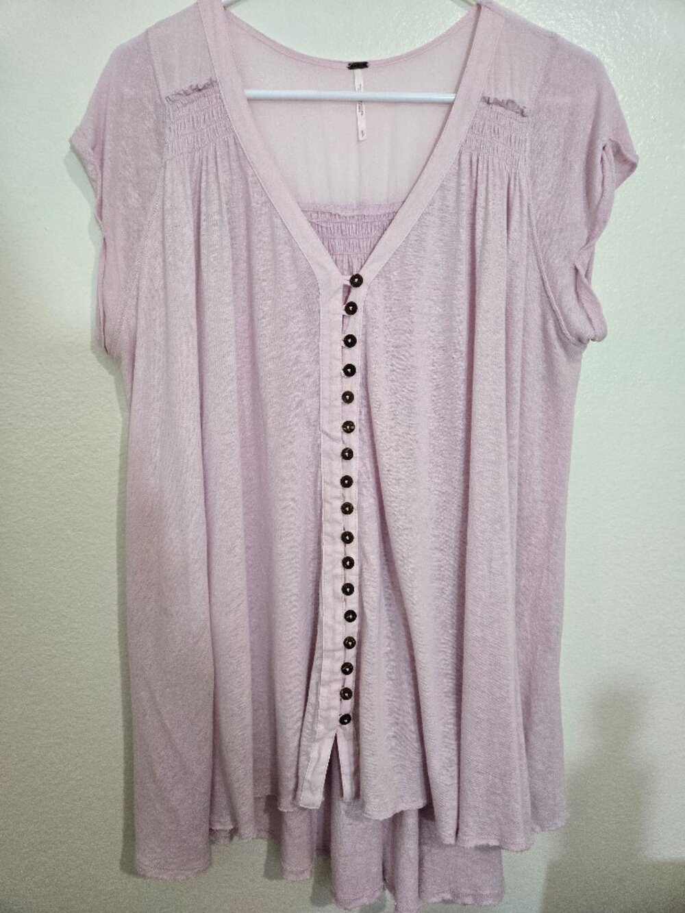 Free People Highland Top in a soft pink hue hobo-inspired size Small